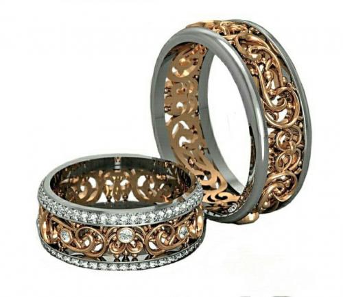 Обручальные кольца необычной формы 0020И - заказать в мастерской Петроголд