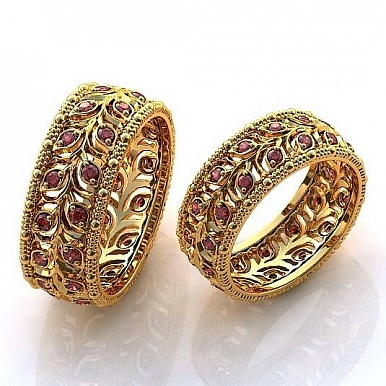 Обручальные кольца ажурные с гранатами из желтого золота 1268Е - заказать в мастерской Петроголд